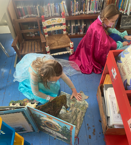 Anna and Elsa at the library at the tail end of a pandemic